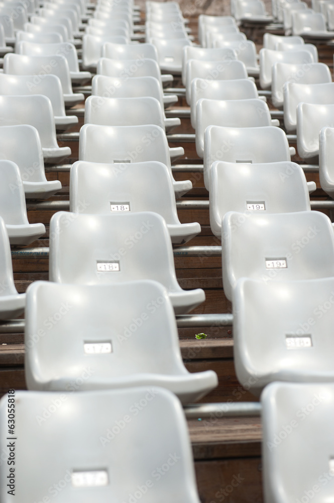 Fototapeta premium Row of grey seats in theater.