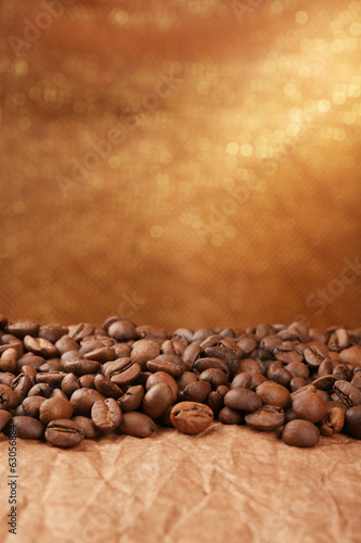 Coffee beans on table on brown background © Africa Studio