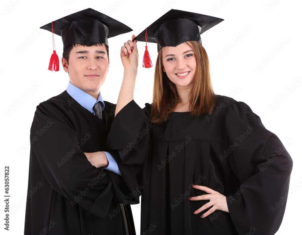 Two happy graduating students isolated on white Two happy graduating students isolated on white