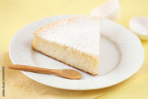 Piece of Milk Cake on a white plate