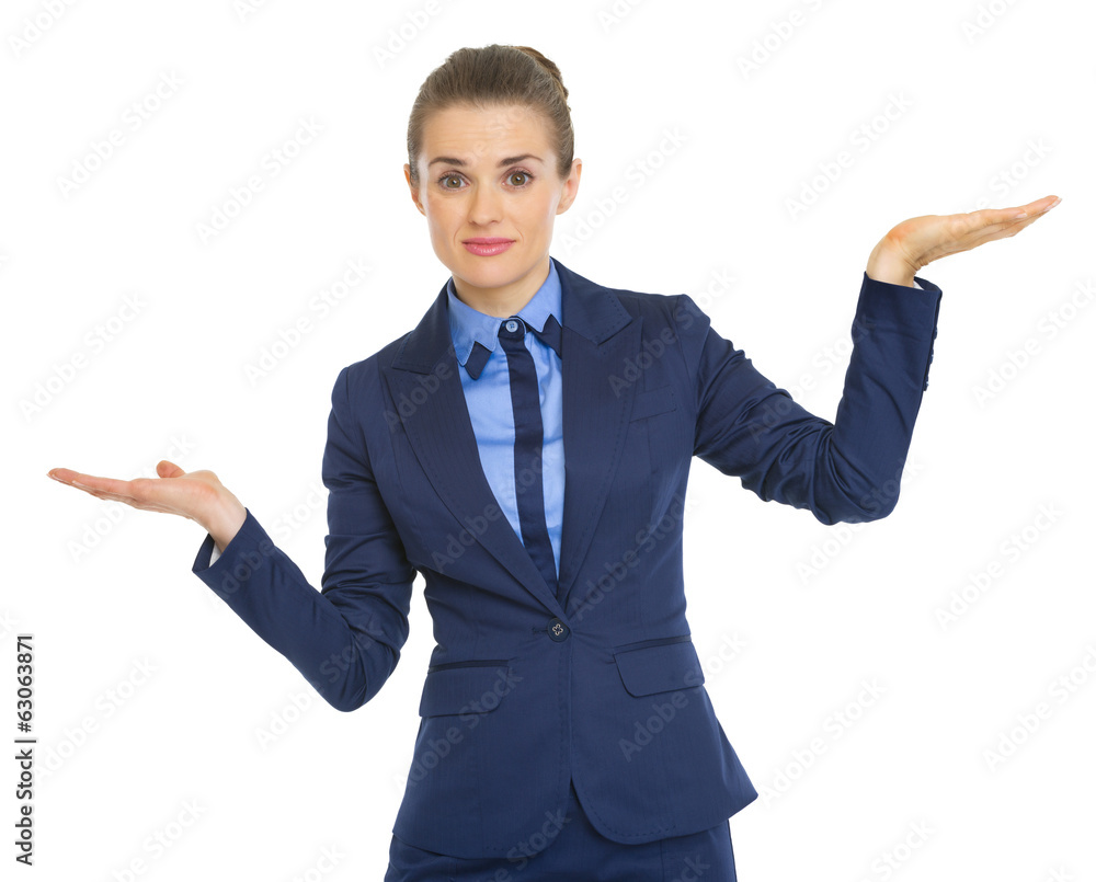 Business woman weighing something Business woman weighing something