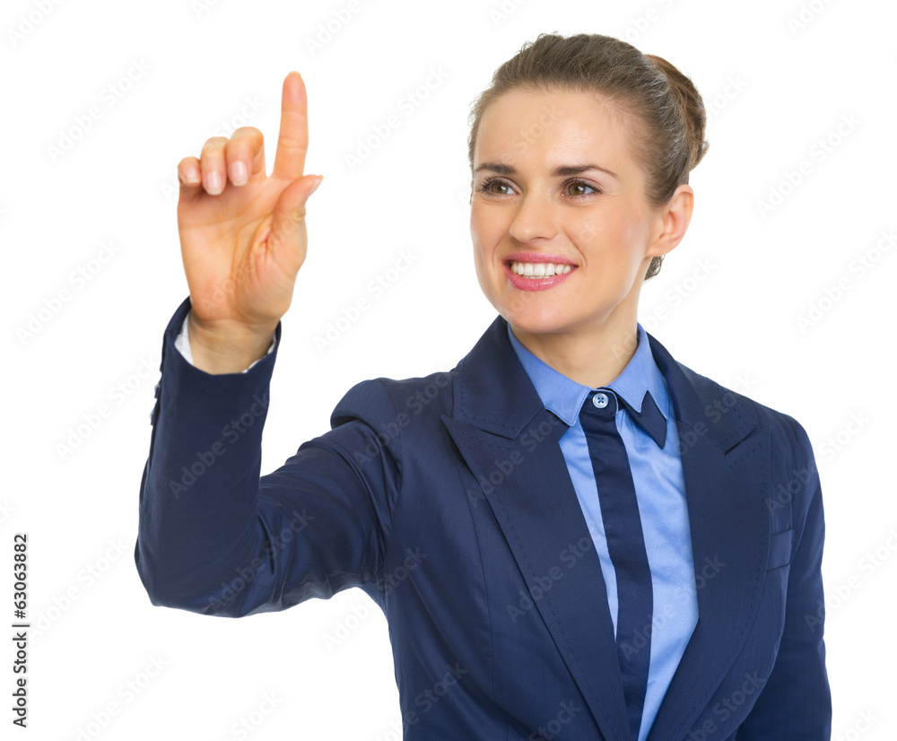 Happy business woman pushing button in the air Happy business woman pushing button in the air