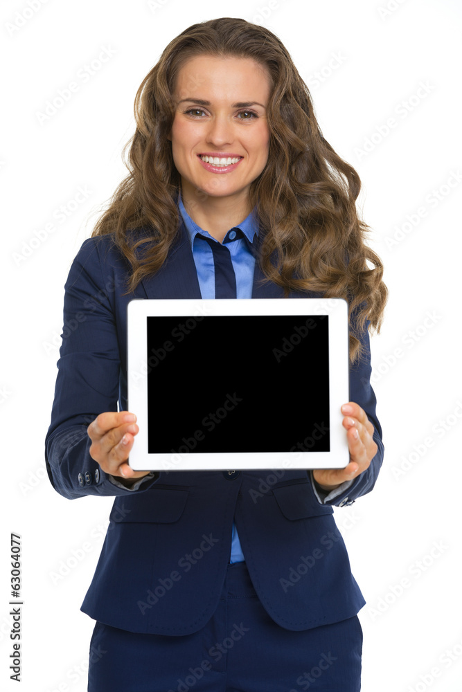 Smiling business woman showing tablet pc blank screen Smiling business woman showing tablet pc blank screen