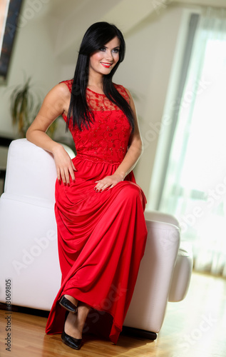 Young woman in red dress