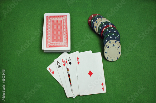 Obraz na plátně Poker Chips and cards on the baize