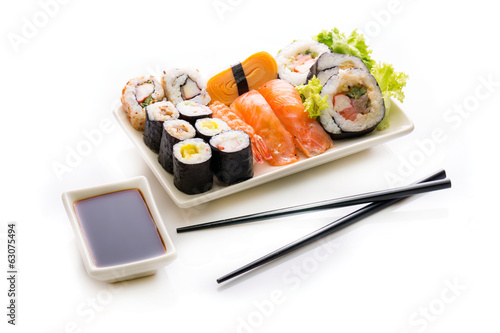 Sushi assortment on white background.