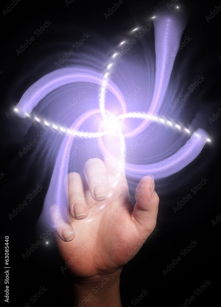 Hand pointing behind shiny swirl Hand pointing behind shiny swirl