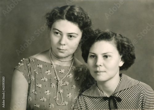 Vintage portrait of two attractive women