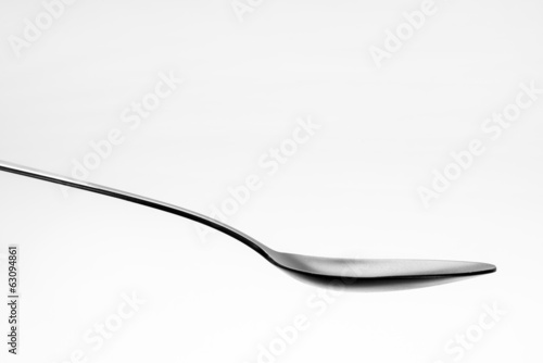 One single black spoon