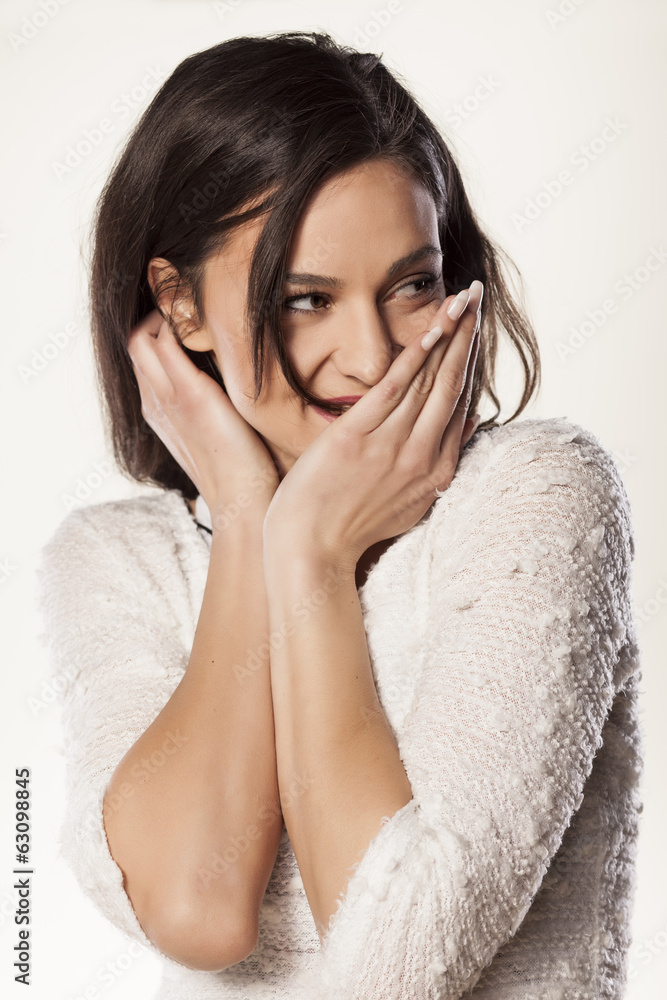 embarrassed girl covers her face with her palms embarrassed girl covers her face with her palms
