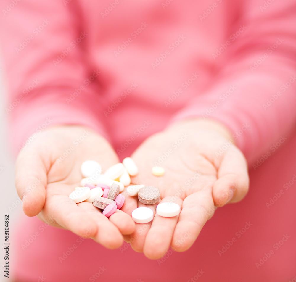 Hand with pills Hand with pills