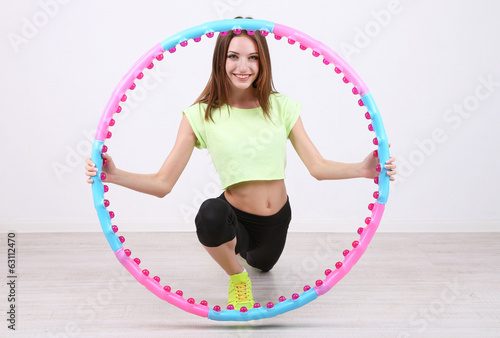 Woman doing exercises with ...