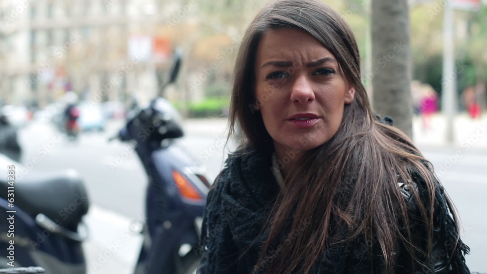 Upset woman sitting in the restaurant, steadycam shot Upset woman sitting in the restaurant, steadycam shot