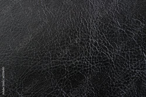 Black leather texture as background © madredus