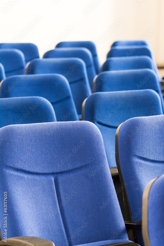 Fototapeta premium Blue Chairs Close Up In Conference Room