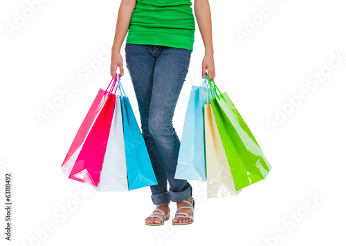 Stunning young woman carrying shopping bags