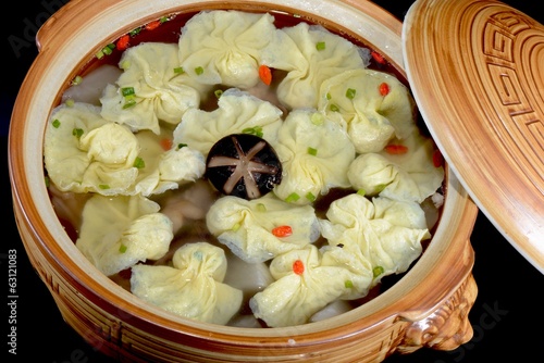 Chinese Food:Boiled dumplings in a pot