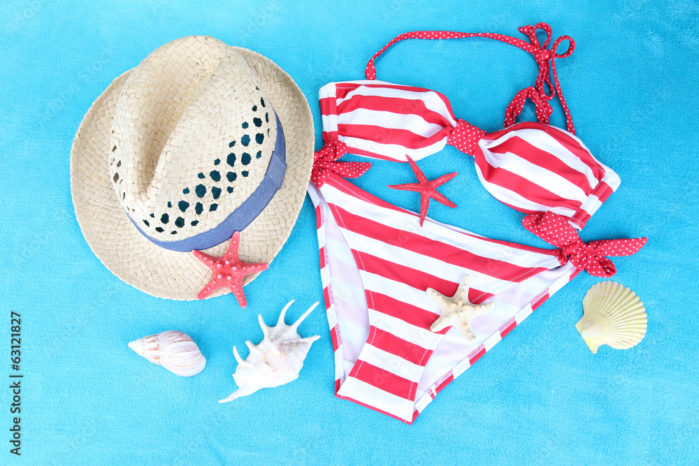 Obraz premium Swimsuit on color background
