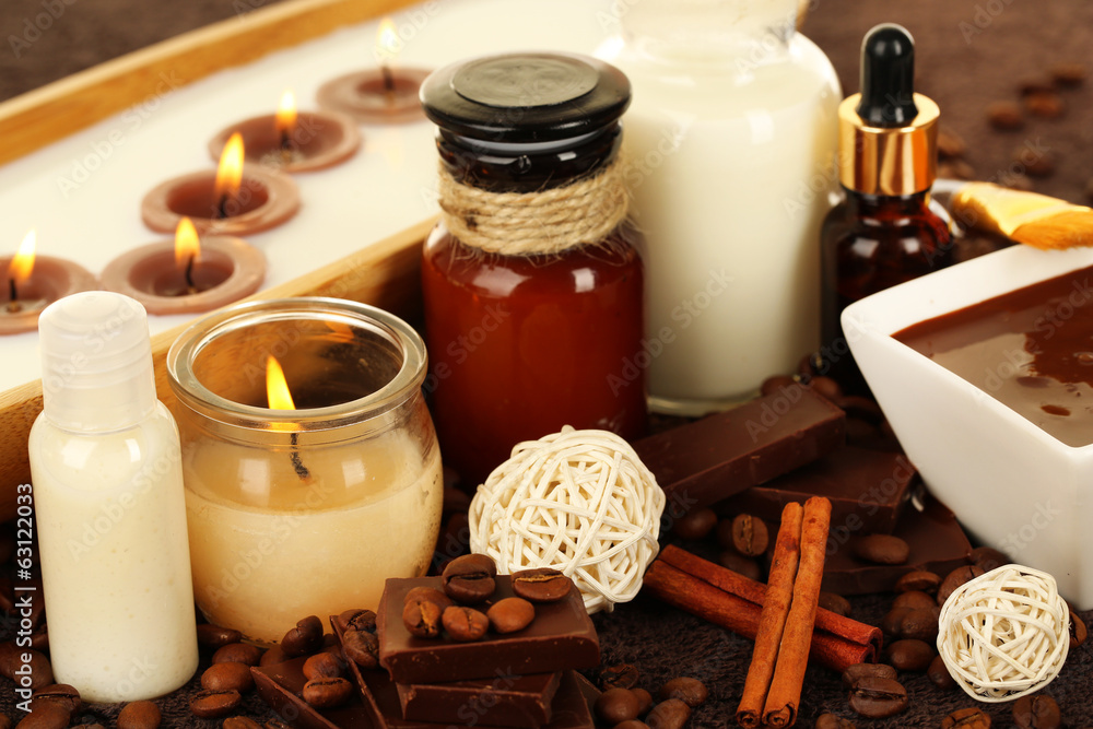 Beautiful chocolate spa setting on wooden table close-up Beautiful chocolate spa setting on wooden table close-up