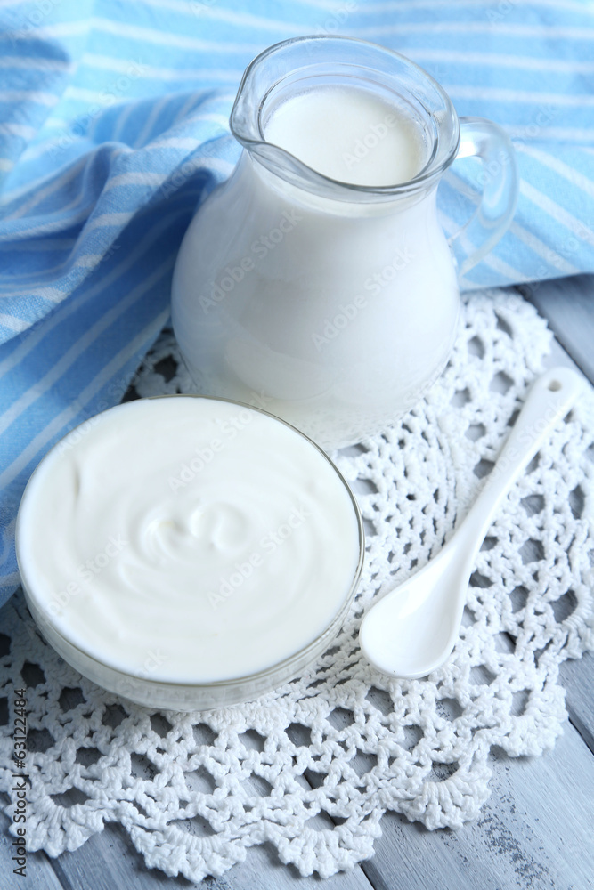 Dairy products on wooden table background Dairy products on wooden table background