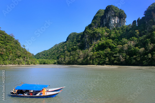 Tourist boats at Island of the Pregnant Maiden lake, Marble Geof