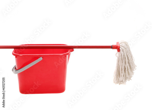 Red bucket with cleaning mop.