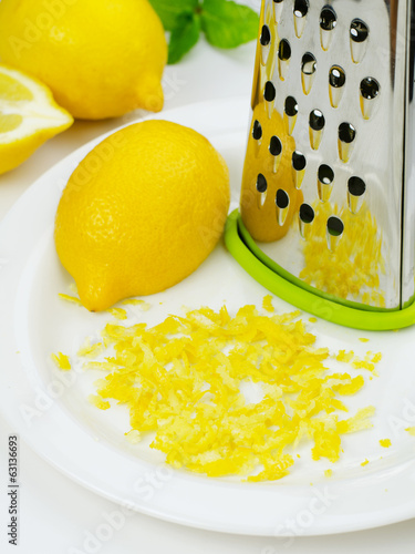 Lemon and lemon zest with grater