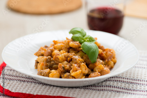 Pisarei o gnocchetti con sugo di fagioli photo