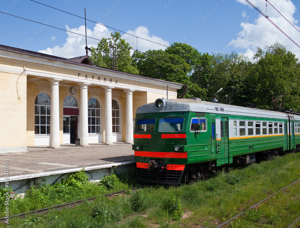 Naklejka premium Electric local train at the platform in rural areas