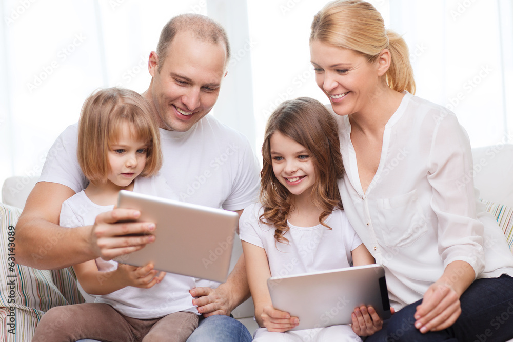 family and two kids with tablet pc computers family and two kids with tablet pc computers