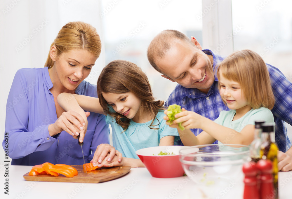 happy family with two kids making dinner at home happy family with two kids making dinner at home