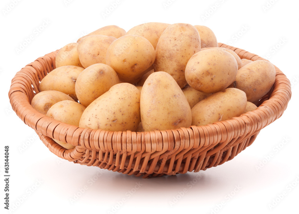 Potato tuber in wicker basket isolated on white background Potato tuber in wicker basket isolated on white background