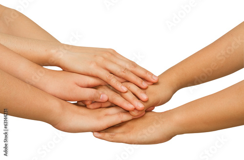  Hands on top of each other showing  unity with their hands toge