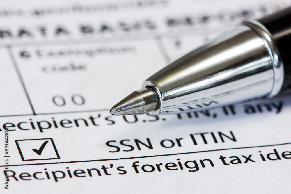 Pen and tax form Pen and tax form