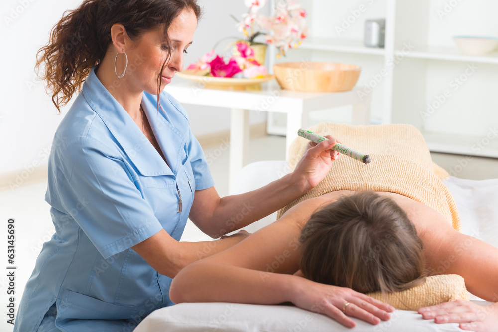Therapist doing moxa treatment Therapist doing moxa treatment