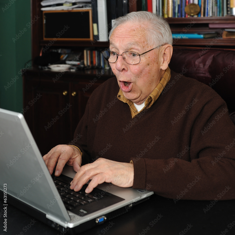 Senior male working on a laptop Senior male working on a laptop