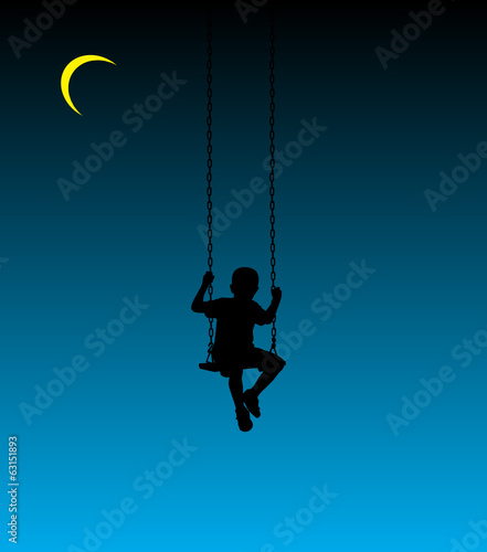 boy on a swing at moon