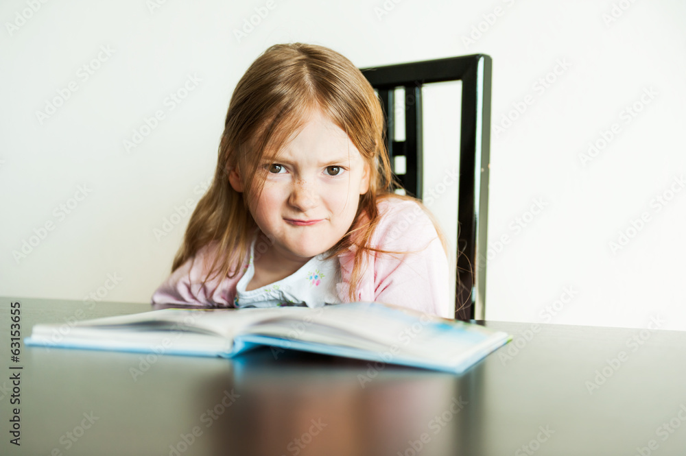 Angry little girl portrait indoors Angry little girl portrait indoors