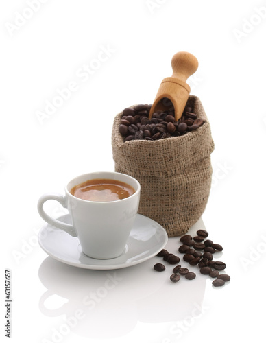 Espresso and a bag of coffee beans with a scoop