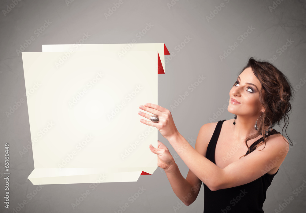 Young woman holding white origami paper copy space Young woman holding white origami paper copy space