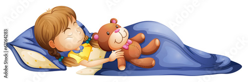A young girl sleeping with a toy