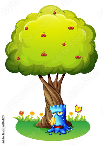 A blue monster sobbing under the tree