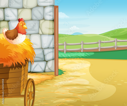 A farm with a hen above the hays