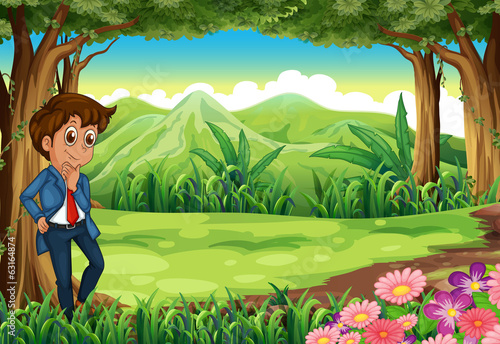 A businessman in the middle of the forest