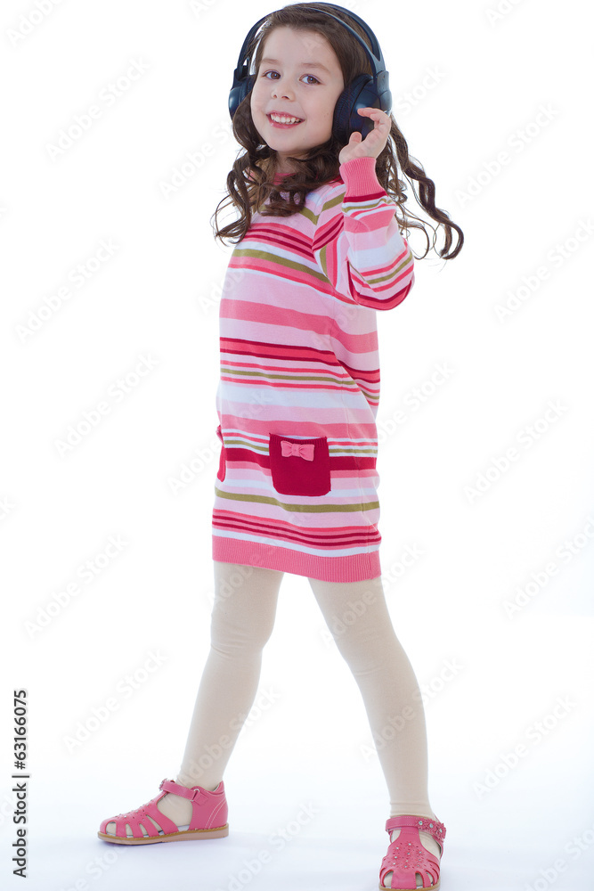 charming and very musical little girl dancing. charming and very musical little girl dancing.