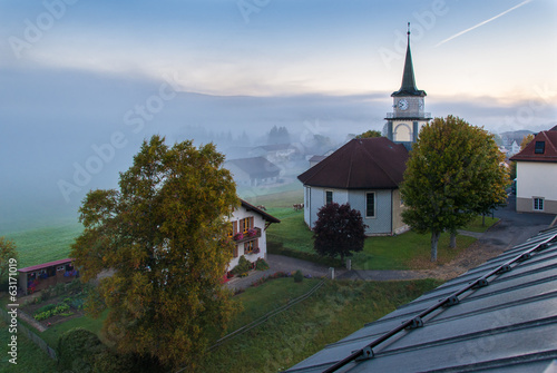 Le Brassus, Switzerland in a foggy winter morning.