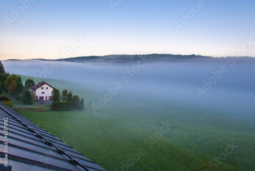 Le Brassus, Switzerland in a foggy winter morning.