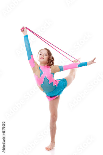 Cute little gymnast practicing with skipping rope © Wisky