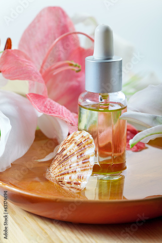 Essential oil for spa treatment in bottle with dropper