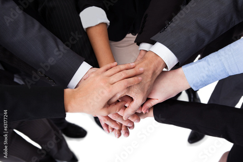 Wallpaper Mural Business people stacking hands Torontodigital.ca